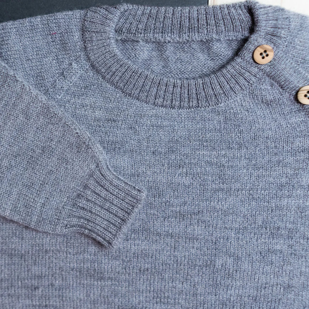 THE WOOLLY BABY SWEATER - cloud grey
