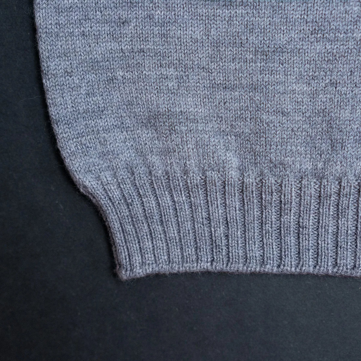 THE WOOLLY BABY SWEATER - cloud grey