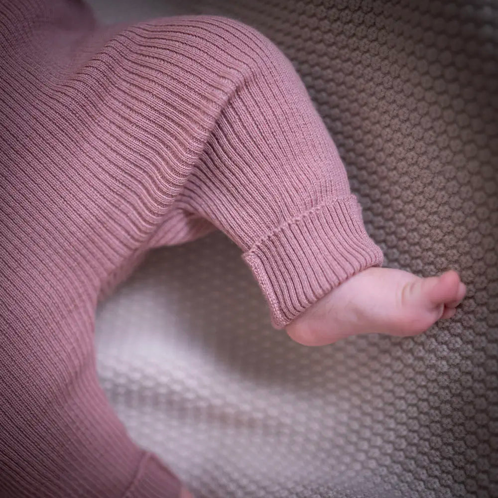 THE WOOLLY BABY JUMPSUIT - rose