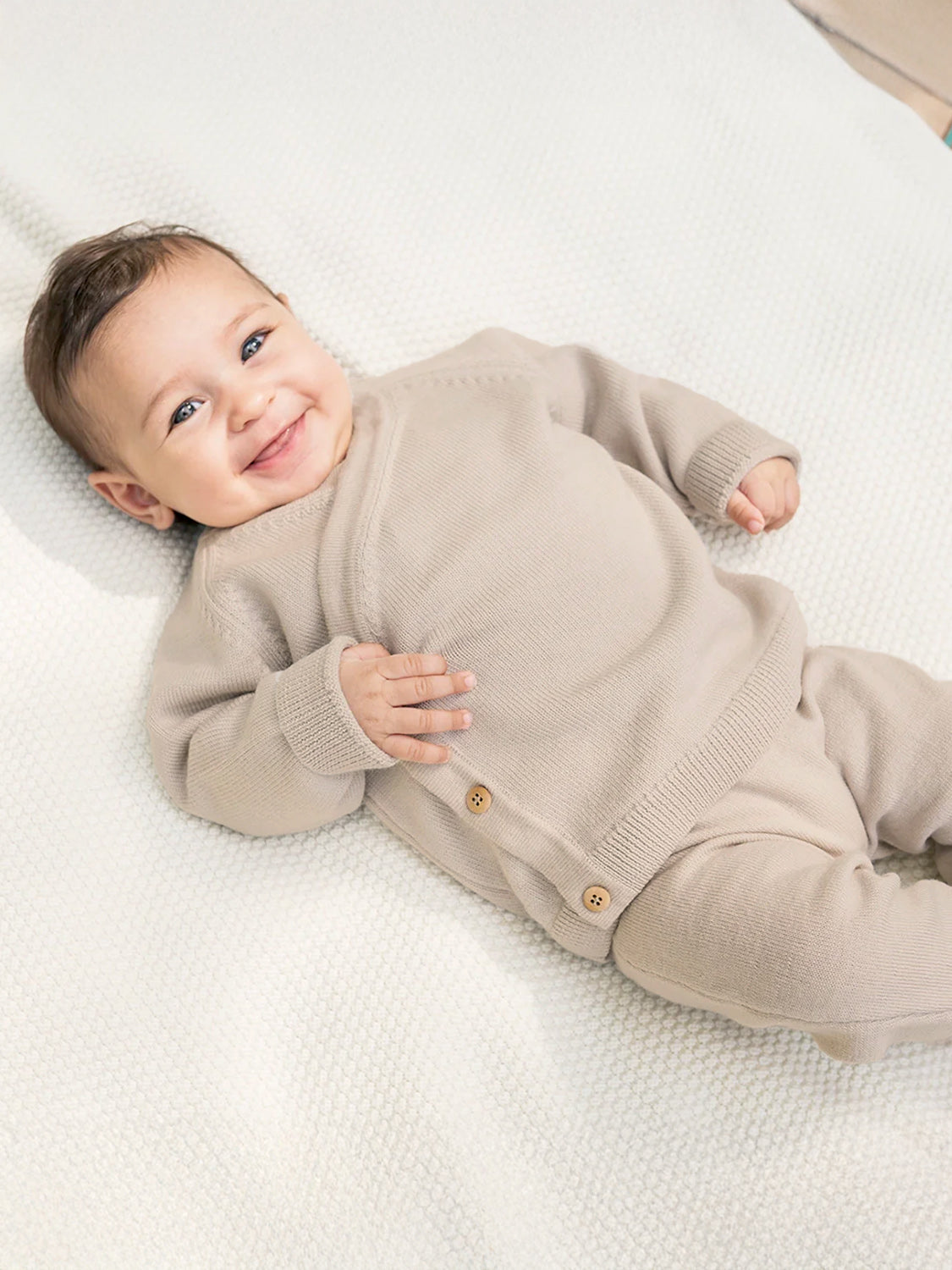 THE WOOLLY BABY JACKET - sand