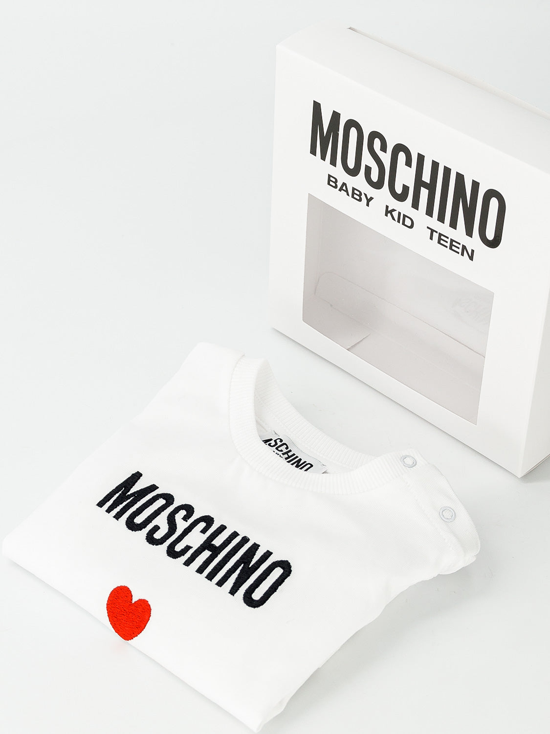 Moschino Kids babygrow White in White 6901884995-10.jpg | NICKIS.com