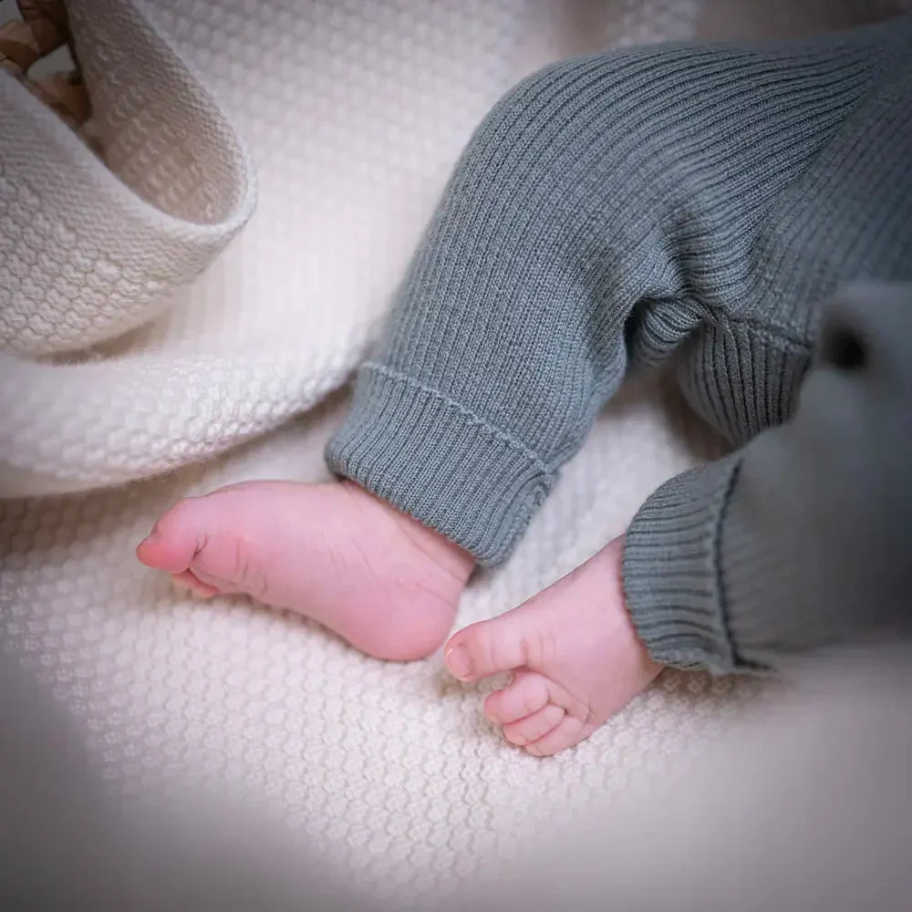 THE WOOLLY BABY JUMPSUIT - blue