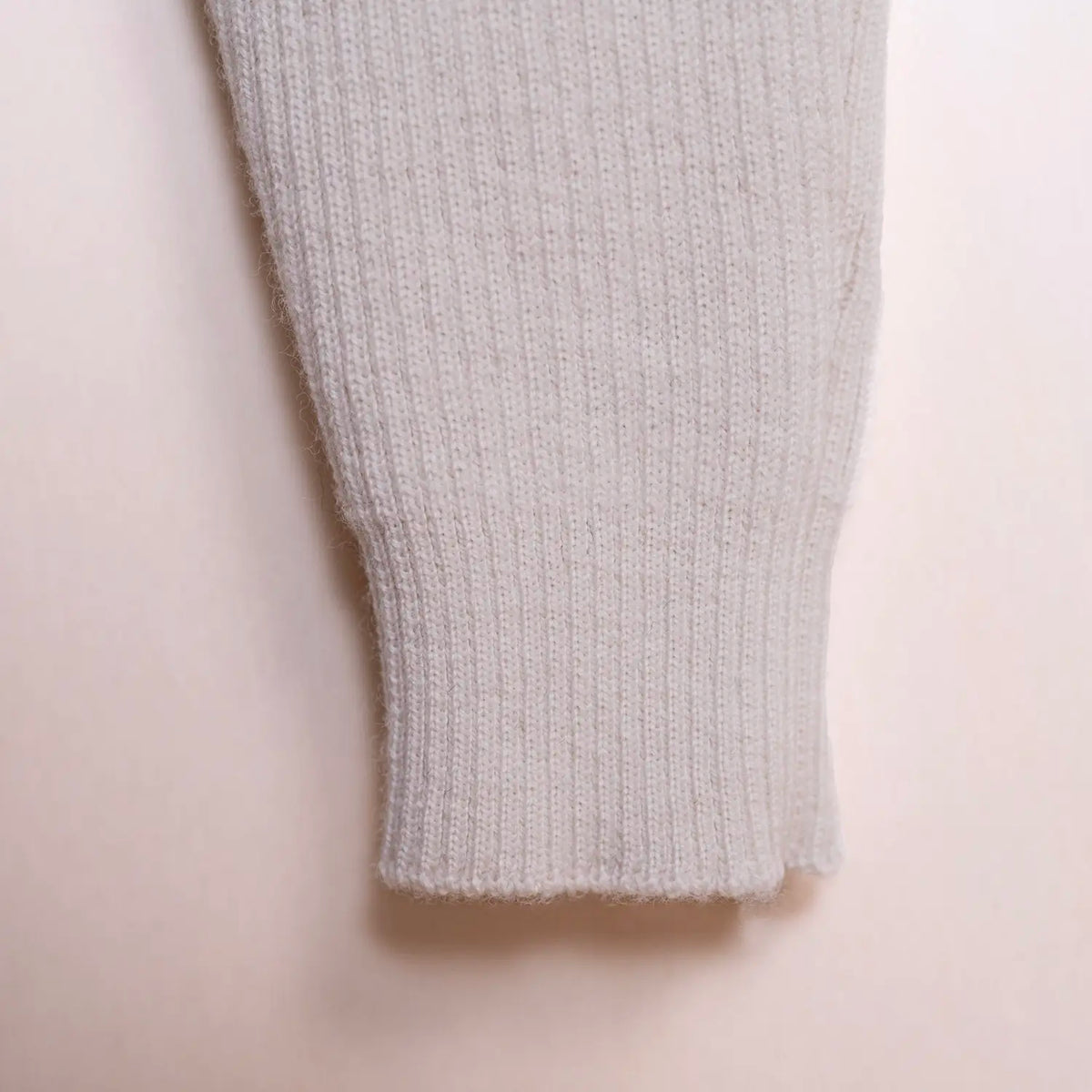 THE WOOLLY BABY JUMPSUIT - sand